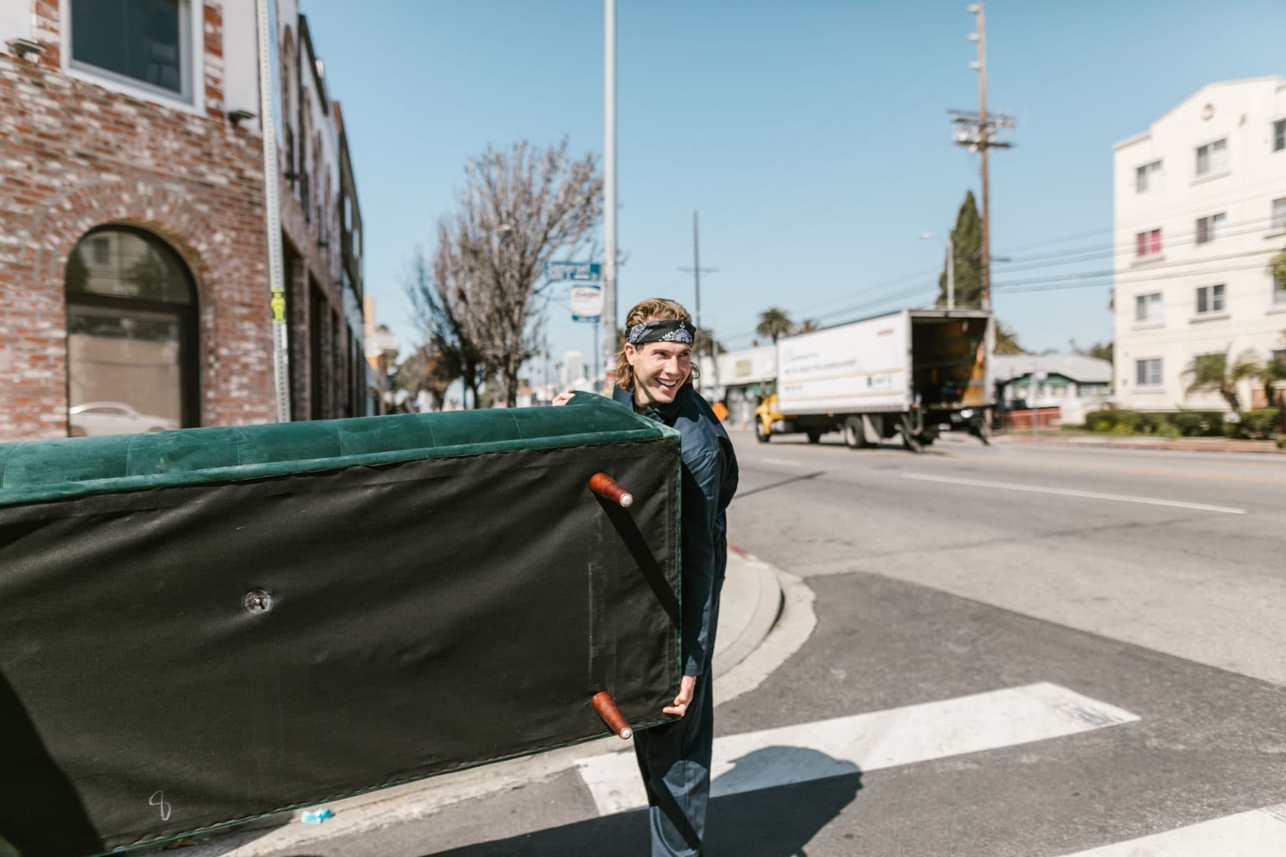 Moving a couch across a Kansas City street